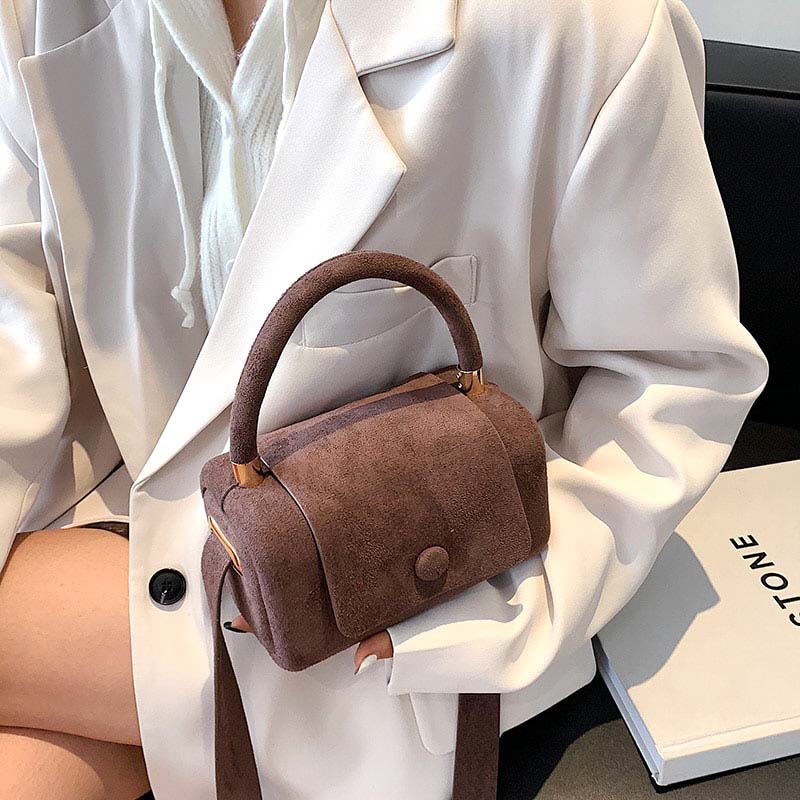 BRYGIDA I LÄSSIGE WILDLEDERHANDTASCHE