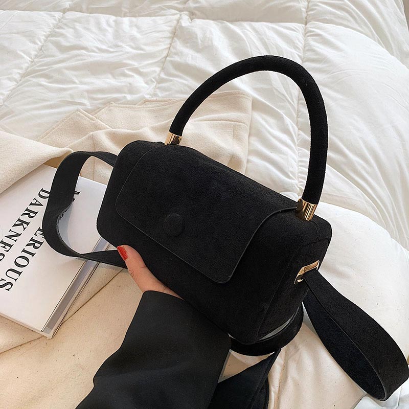 BRYGIDA I LÄSSIGE WILDLEDERHANDTASCHE