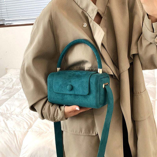 BRYGIDA I LÄSSIGE WILDLEDERHANDTASCHE